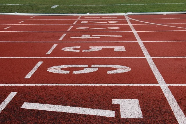 Limits and derivatives class 11: A running track with lane numbers, suggesting a starting line or limit.