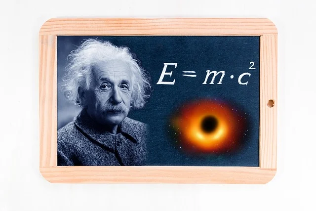 Albert Einstein, E=mc^2 formula, and a black hole on a slate
