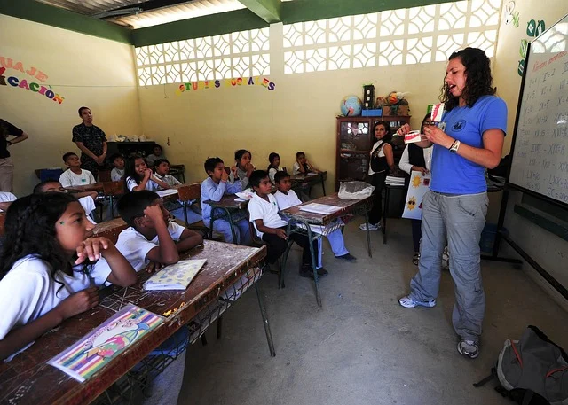 Degrees to radians: A teacher giving a lesson to students in a classroom