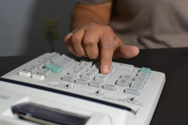 Inverse trig functions: A hand using an adding machine calculator