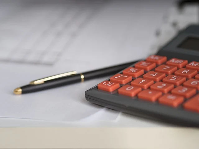 Quadratic formula: A calculator and a pen on a piece of paper.