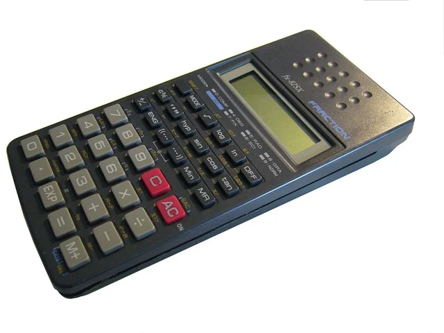 A scientific calculator with sin, cos, and tan buttons visible.