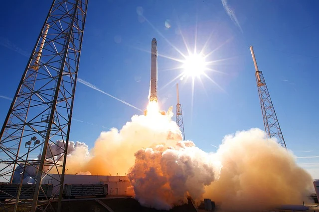 Projectile motion: A rocket launching into the sky, creating a large plume of smoke.