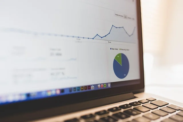 Exponential function: A laptop screen displaying analytics data with a line graph